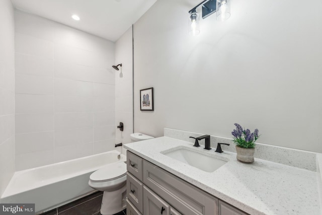 1955 Fairlawn St SE Unit 203, Washington, DC 20020 - bathroom featuring toilet, vanity, tub / shower combination, and tile patterned flooring