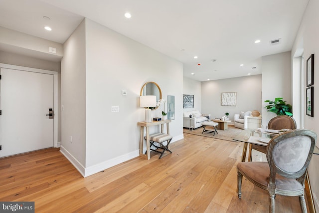 interior space featuring recessed lighting, visible vents, and light wood-style flooring