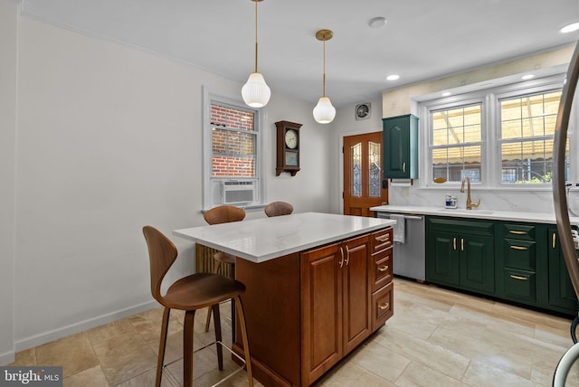 kitchen featuring pendant lighting, a kitchen bar, a center island, a sink, and dishwasher