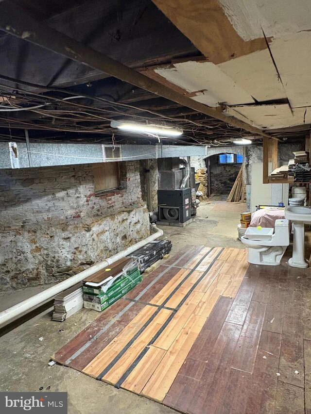 425 N 62nd St, Philadelphia, PA 19151 - unfinished basement featuring hardwood / wood-style flooring