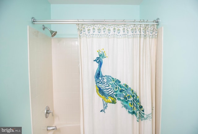 full bath featuring shower / bathtub combination with curtain