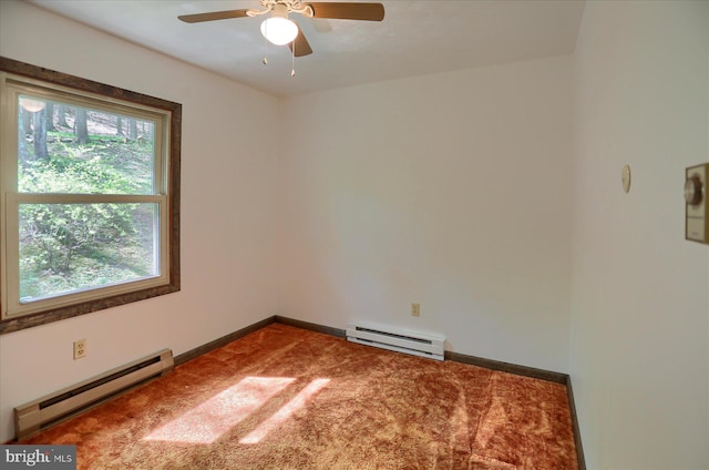 carpeted empty room featuring baseboards, ceiling fan, and a baseboard heating unit