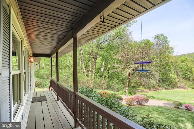 deck featuring a yard