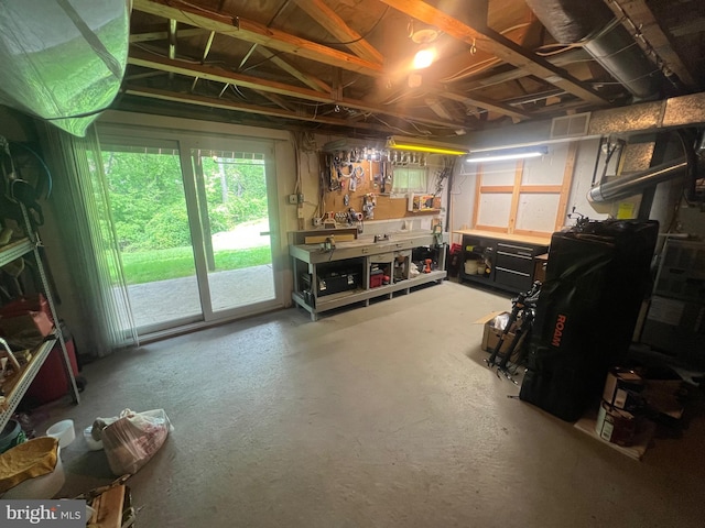 below grade area with a workshop area