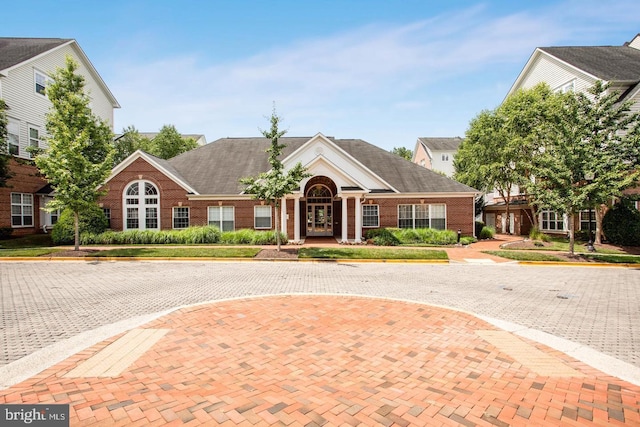 view of front of property with brick siding