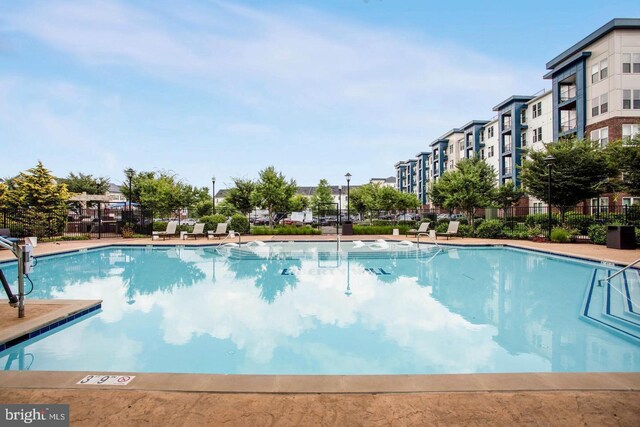community pool with fence