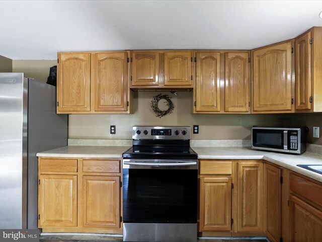 kitchen featuring light countertops and stainless steel appliances