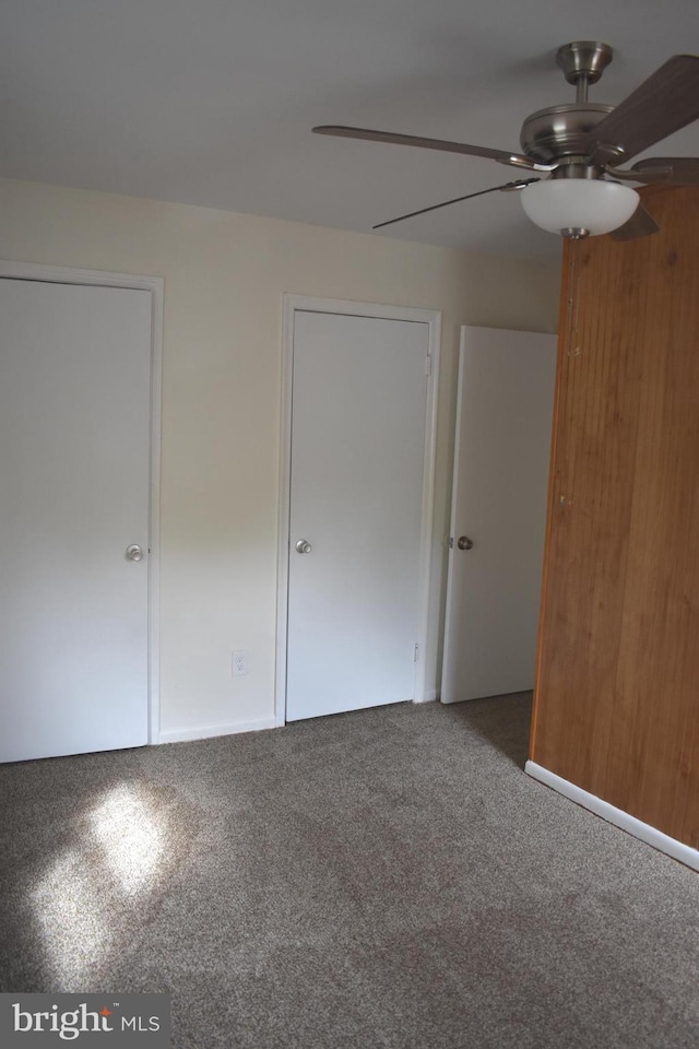 1920 Potomac Rd, Edgewater, MD 21037 - unfurnished bedroom featuring a ceiling fan and carpet flooring