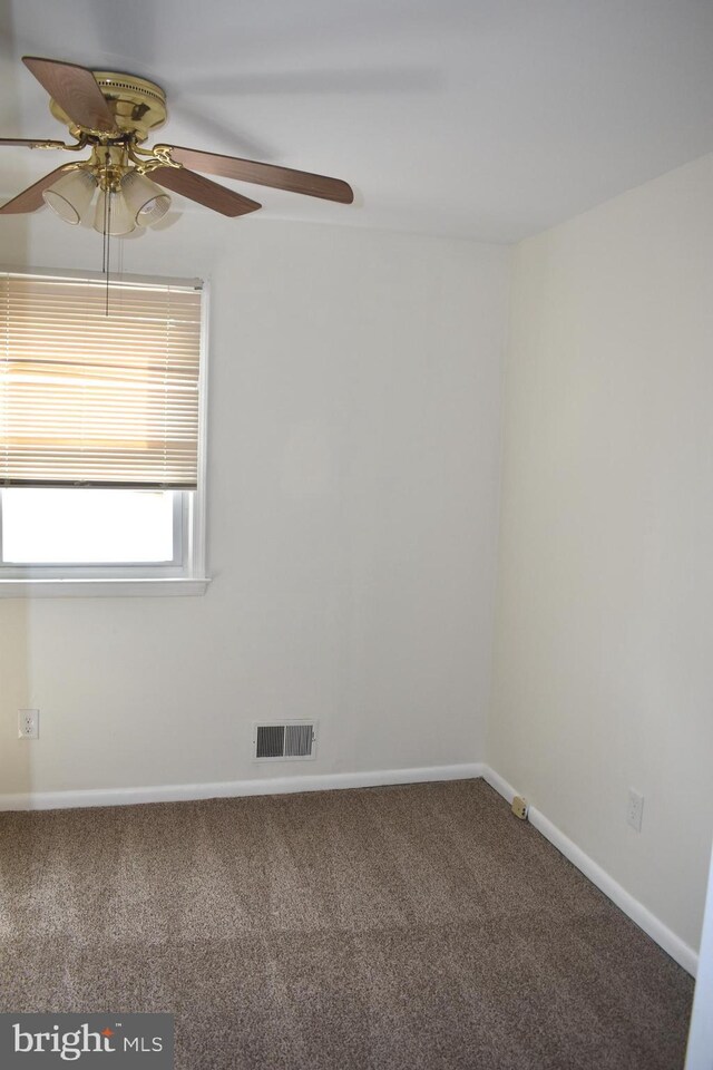 1920 Potomac Rd, Edgewater, MD 21037 - carpeted spare room with a ceiling fan, baseboards, and visible vents