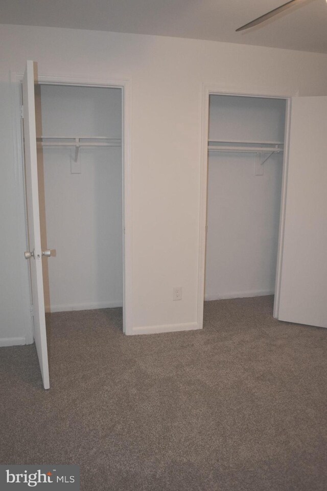 1920 Potomac Rd, Edgewater, MD 21037 - unfurnished bedroom with multiple closets and carpet flooring