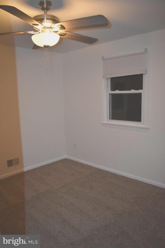 1920 Potomac Rd, Edgewater, MD 21037 - spare room featuring carpet floors, a ceiling fan, baseboards, and visible vents