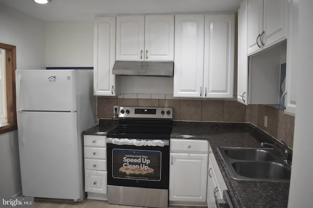 1920 Potomac Rd, Edgewater, MD 21037 - kitchen featuring white cabinets, a sink, electric stove, freestanding refrigerator, and under cabinet range hood
