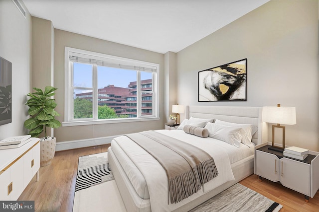 2600 Pennsylvania Ave NW Unit 601/6D, Washington, DC 20037 - bedroom featuring light wood-style floors and baseboards