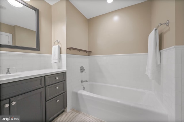2600 Pennsylvania Ave NW Unit 601/6D, Washington, DC 20037 - full bath with a garden tub, wainscoting, vanity, tile patterned flooring, and tile walls