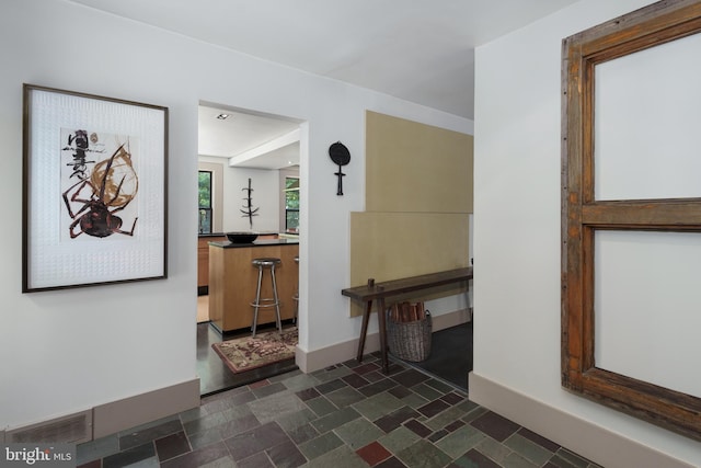 corridor with baseboards