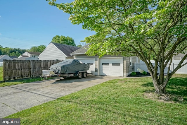 20 Aspen Dr, Pennsville, NJ 08070 - garage with fence and driveway