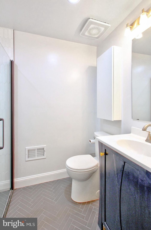 full bath with toilet, visible vents, a shower stall, and vanity