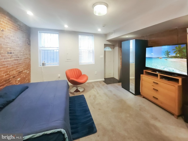 bedroom with light carpet, brick wall, recessed lighting, baseboards, and visible vents