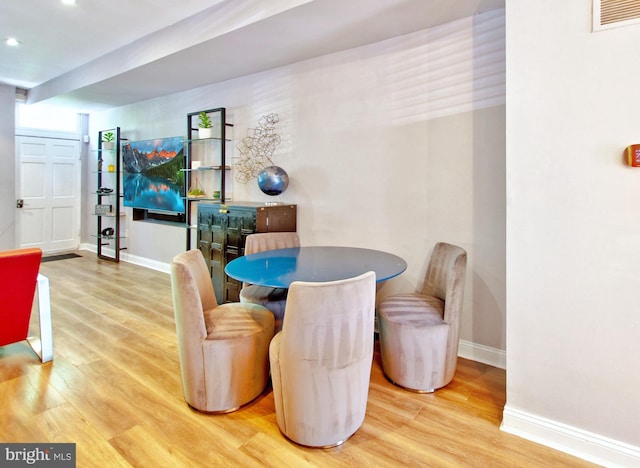 dining area featuring baseboards, recessed lighting, wood finished floors, and visible vents
