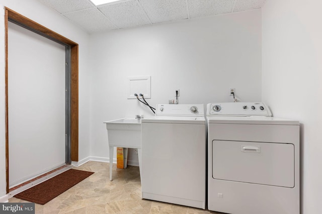 3403 Toone St, Baltimore, MD 21224 - clothes washing area featuring washer and dryer