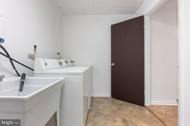 3403 Toone St, Baltimore, MD 21224 - laundry room featuring washer and dryer and baseboards