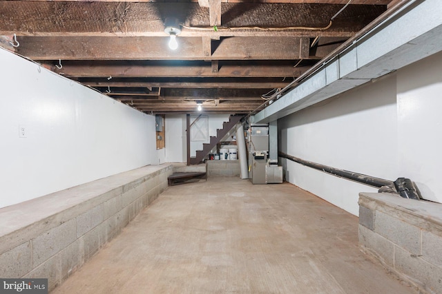 3403 Toone St, Baltimore, MD 21224 - unfinished basement with stairs and heating unit