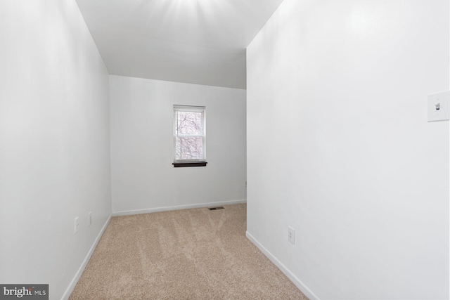 3403 Toone St, Baltimore, MD 21224 - carpeted empty room with baseboards