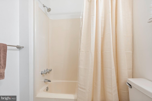 3403 Toone St, Baltimore, MD 21224 - bathroom featuring shower / tub combo and toilet