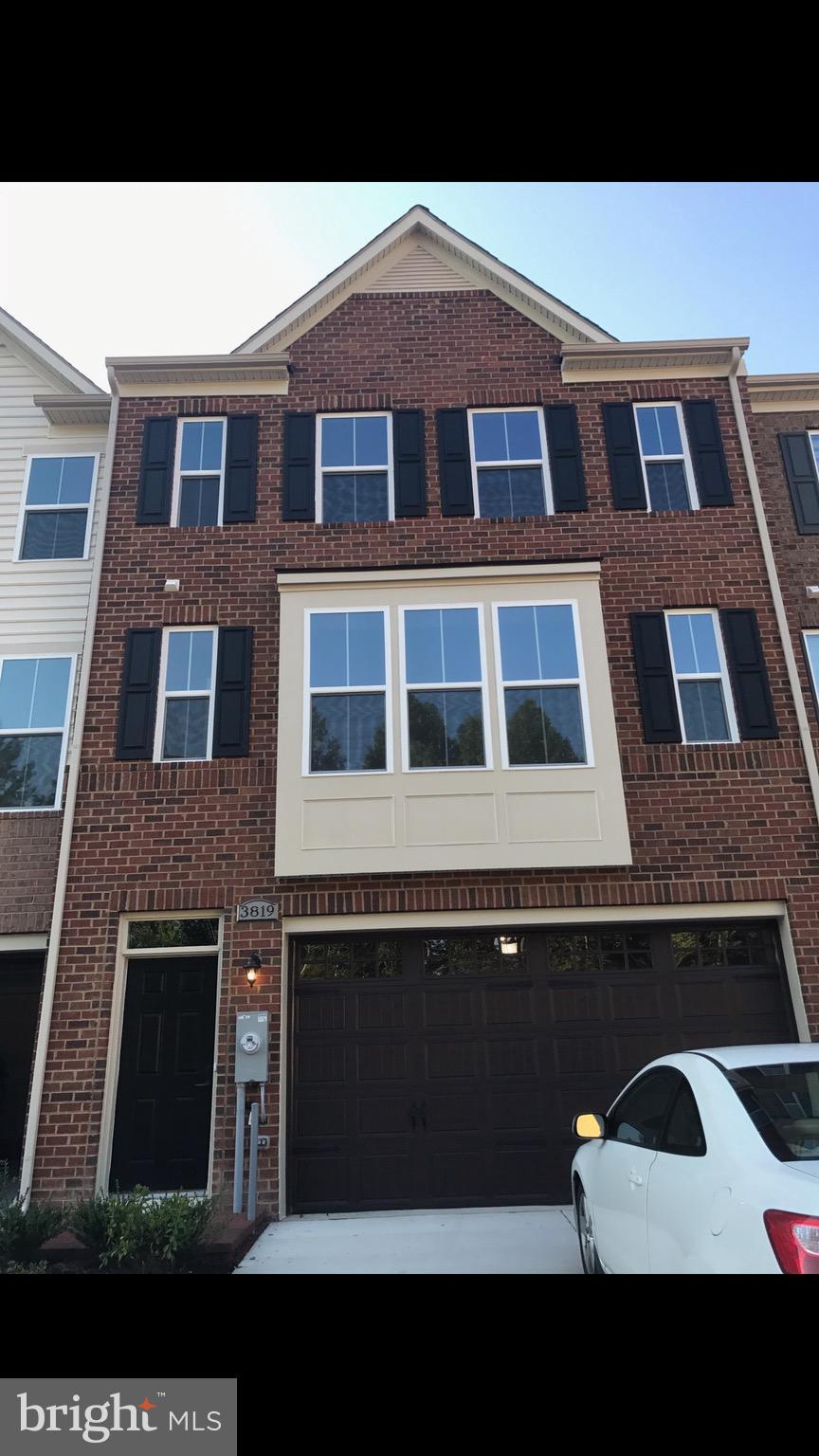 3819 Effie Fox Way, Upper Marlboro, MD 20774 - multi unit property featuring brick siding and an attached garage