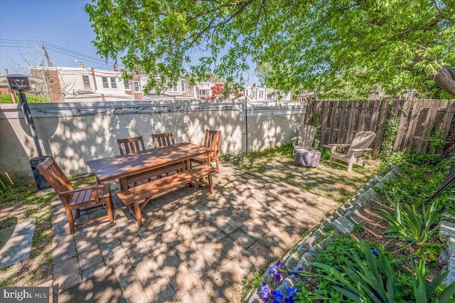 view of patio / terrace with fence and outdoor dining area