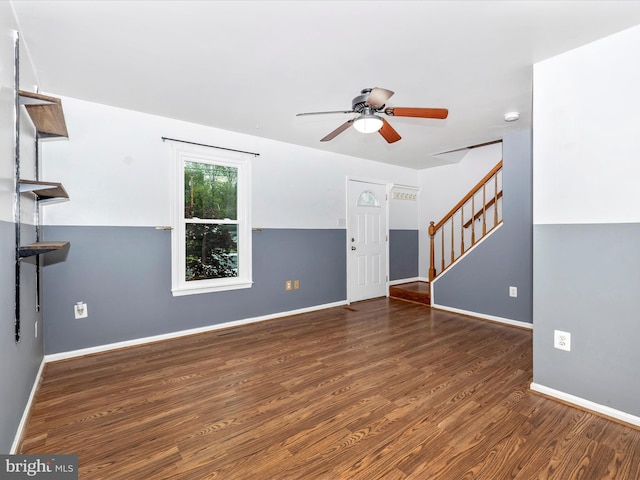201 N 2nd St, Woodsboro, MD 21798 - unfurnished living room featuring a ceiling fan, wood finished floors, stairs, and baseboards