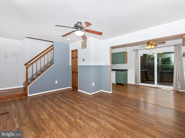 201 N 2nd St, Woodsboro, MD 21798 - unfurnished living room featuring a ceiling fan, wood finished floors, stairs, and baseboards