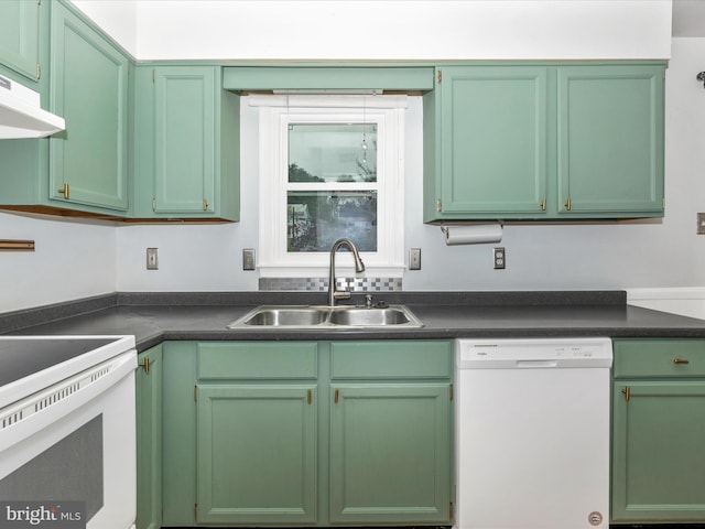 201 N 2nd St, Woodsboro, MD 21798 - kitchen with white appliances, a sink, green cabinetry, and dark countertops