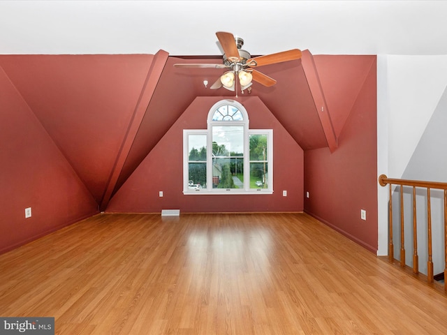 201 N 2nd St, Woodsboro, MD 21798 - additional living space with light wood finished floors, lofted ceiling, ceiling fan, and baseboards