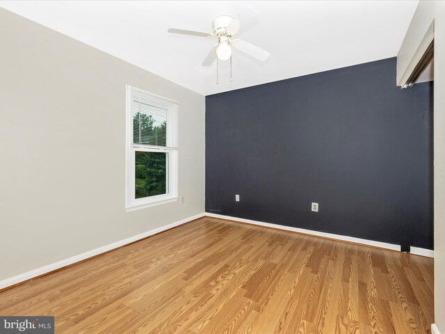 201 N 2nd St, Woodsboro, MD 21798 - spare room featuring light wood-style floors, baseboards, and a ceiling fan