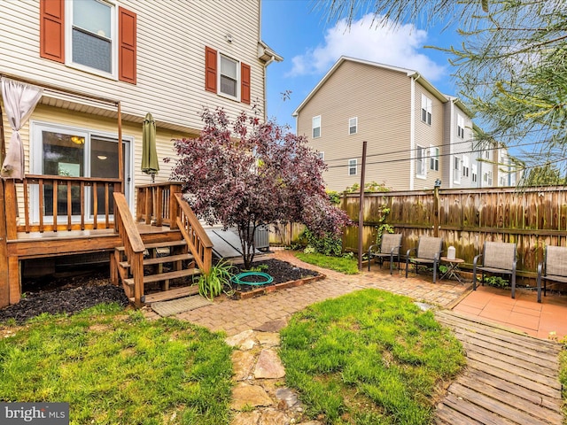 201 N 2nd St, Woodsboro, MD 21798 - fenced backyard with a wooden deck and a patio area
