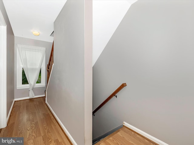 201 N 2nd St, Woodsboro, MD 21798 - stairs featuring wood finished floors and baseboards