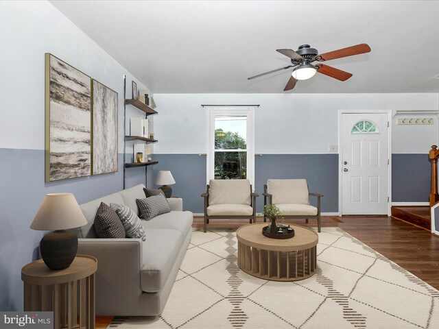 201 N 2nd St, Woodsboro, MD 21798 - living room featuring ceiling fan, wood finished floors, and baseboards