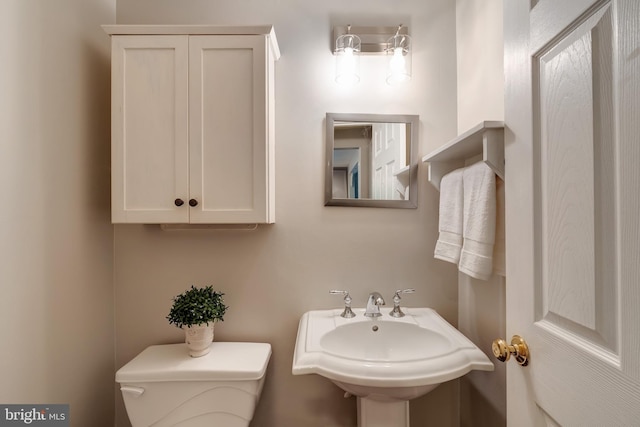 15926 Uppsala Ct, Woodbridge, VA 22191 - half bathroom with a sink and toilet