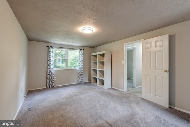 15926 Uppsala Ct, Woodbridge, VA 22191 - spare room with a textured ceiling, carpet, and baseboards