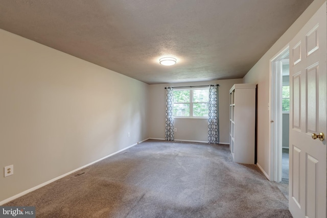 15926 Uppsala Ct, Woodbridge, VA 22191 - carpeted empty room featuring a textured ceiling and baseboards