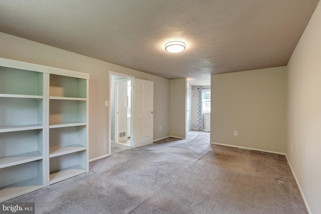 15926 Uppsala Ct, Woodbridge, VA 22191 - empty room featuring carpet floors, baseboards, and a textured ceiling