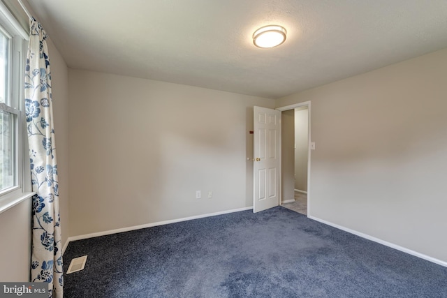 15926 Uppsala Ct, Woodbridge, VA 22191 - carpeted spare room with baseboards