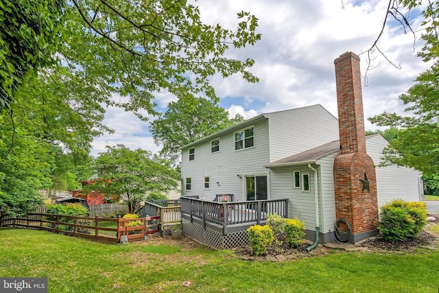 15926 Uppsala Ct, Woodbridge, VA 22191 - back of house with a chimney and a wooden deck