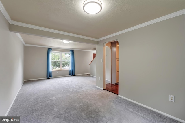 15926 Uppsala Ct, Woodbridge, VA 22191 - carpeted spare room with crown molding, baseboards, and a textured ceiling