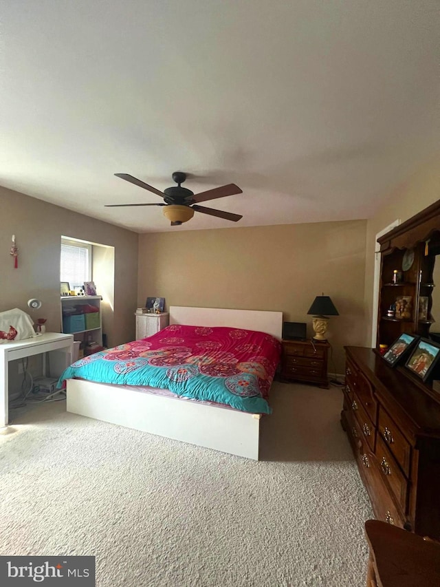 bedroom with carpet floors and ceiling fan