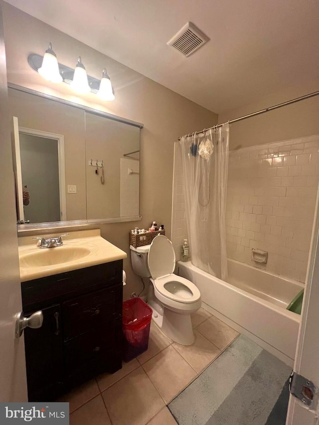 bathroom featuring visible vents, shower / bathtub combination with curtain, tile patterned flooring, and toilet