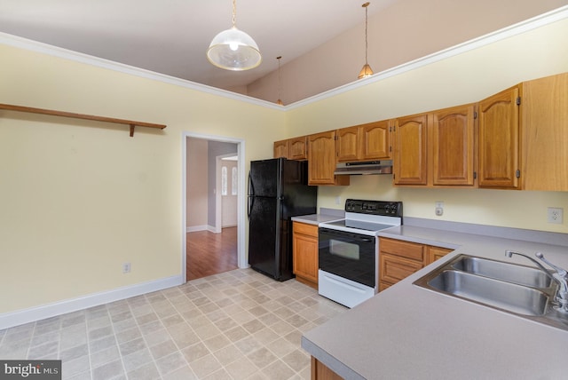 kitchen with freestanding refrigerator, light countertops, under cabinet range hood, a sink, and range with electric cooktop