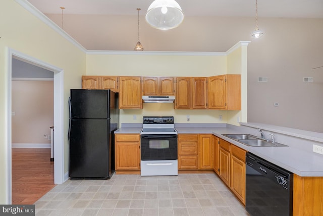 kitchen featuring light countertops, a sink, black appliances, a peninsula, and under cabinet range hood