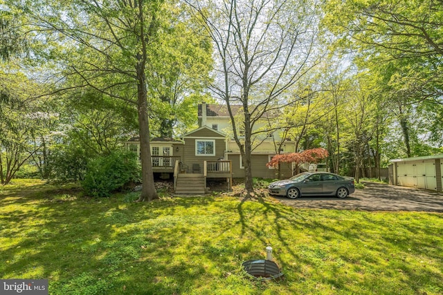 view of yard featuring a wooden deck